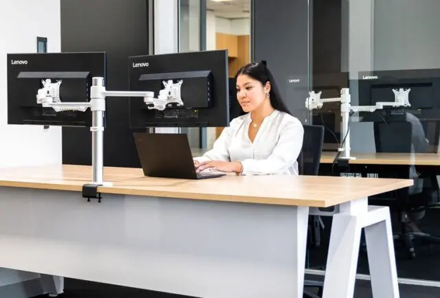 A women using computer at technology test lab facility in Sydney office