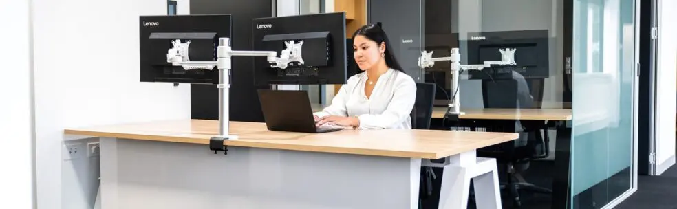 A women using computer at technology test lab facility in Sydney office