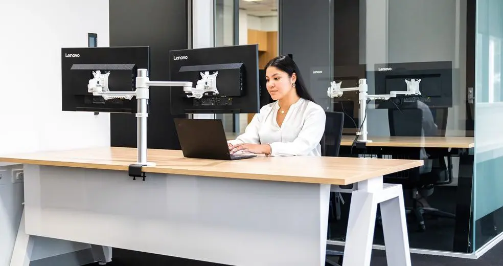 A women using computer at technology test lab facility in Sydney office
